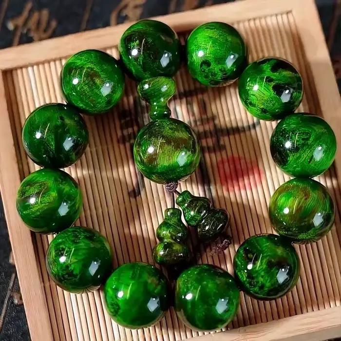 Bracelet en bois ambré, peinture à l'encre, aquilaire du nord-est, plein de Pinus, tabulaeformis, ci