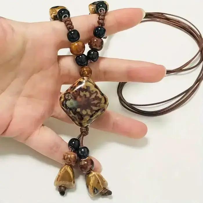 Collier en céramique artistique rétro polyvalent pour femmes, longue chaîne de pull géométrique bohè