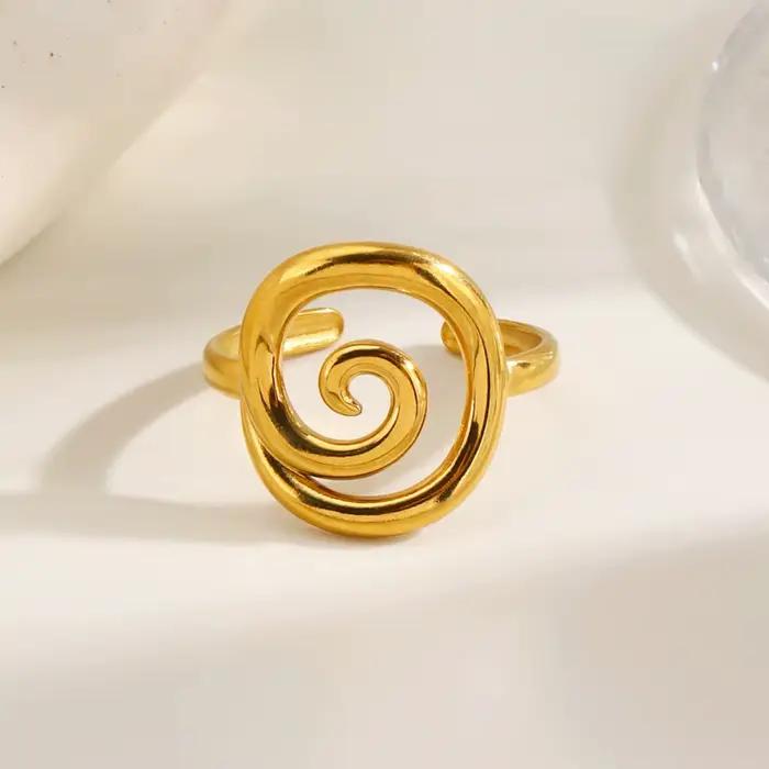 Bague tendance en acier inoxydable de luxe léger avec motif tourbillon circulaire ouvert, accessoire