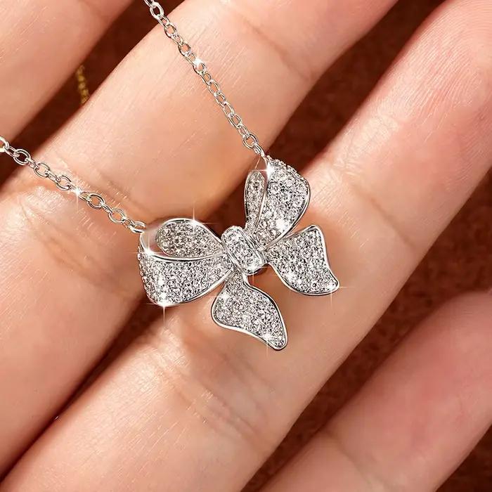 Collier pendentif Rrjzz en moissanite brillante sertie pavé pour femme, collier nœud papillon exquis et tendance, cadeaux de bijoux de mariage