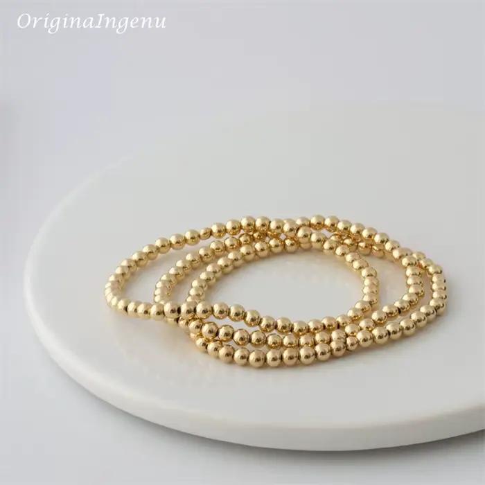 Bracelet élastique en perles d'or fait à la main, rempli d'or 14K, résistant au ternissement, bijoux Boho Vintage pour femmes