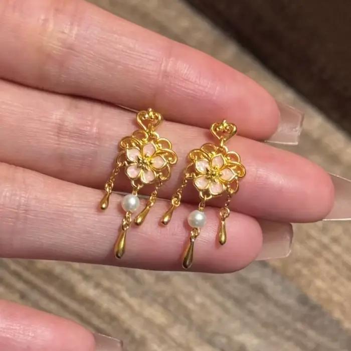 Boucles d'oreilles en fleurs de cerisier pour femmes, style palais, élégantes, romantiques, chics, douces, légères, de luxe, avec pompon, bijoux, nouvelle collection
