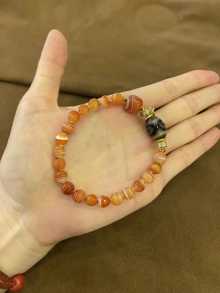 Bracelet monocouche en agate orange avec perle Dzi