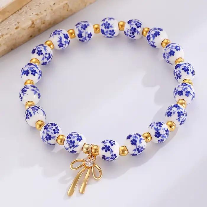 Bracelet en céramique avec nœud fait à la main, bleu et blanc, corde élastique réglable chinoise, pendentif pour fille à la mode, accessoires cadeau