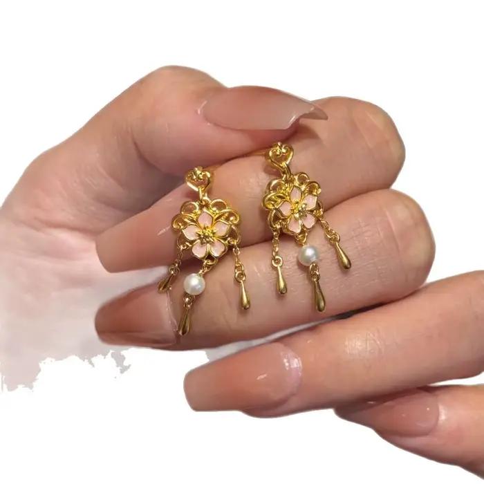 Boucles d'oreilles en fleurs de cerisier pour femmes, style palais, élégantes, romantiques, chics, douces, légères, de luxe, avec pompon, bijoux, nouvelle collection