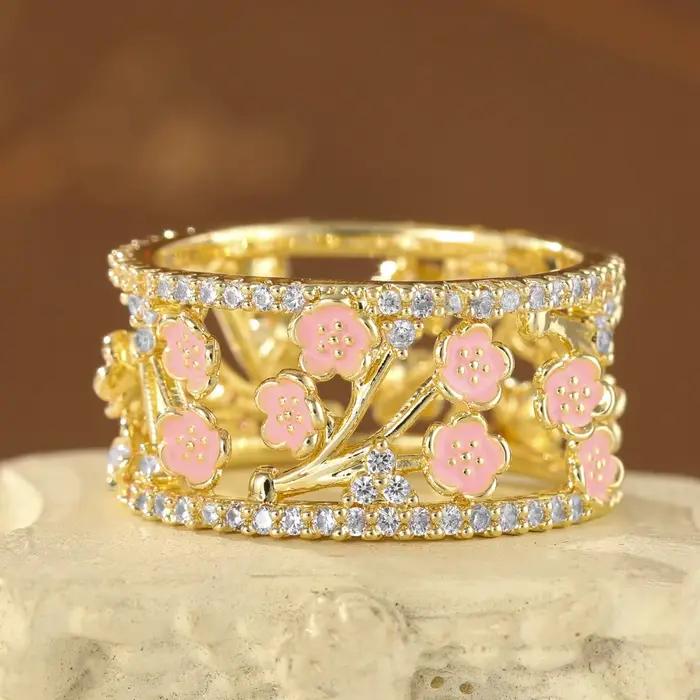 Bague élégante en cuivre de luxe pour femmes, avec fleurs roses et pierres artificielles incrustées, idéale pour les loisirs et les rendez-vous.
