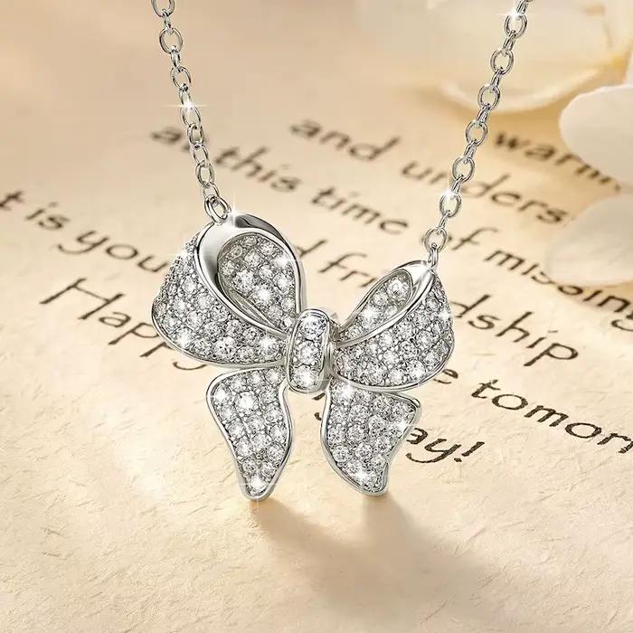 Collier pendentif Rrjzz en moissanite brillante sertie pavé pour femme, collier nœud papillon exquis et tendance, cadeaux de bijoux de mariage