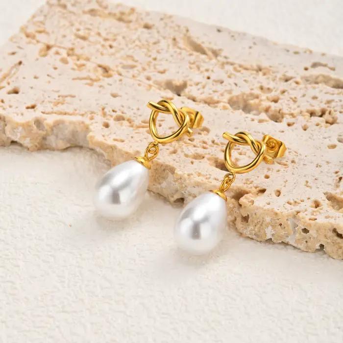 Boucles d'oreilles pendantes avec perle en forme de goutte et nœud, en acier inoxydable plaqué or 18 carats, bijoux étanches et anti-ternissement, cadeau idéal pour les fêtes