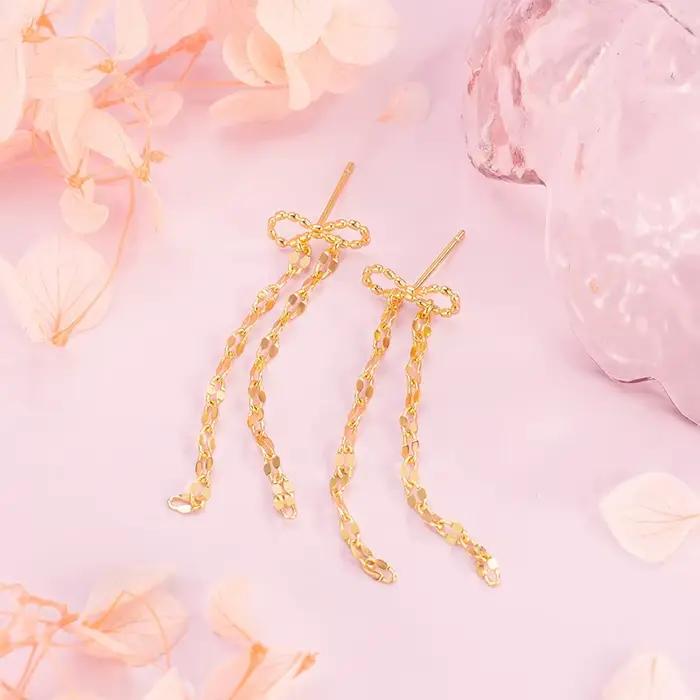 Boucles d'oreilles à pompons dorés 2026 – Design minimaliste, bijoux haut de gamme pour femme, style mode soirée, individualité mise en valeur