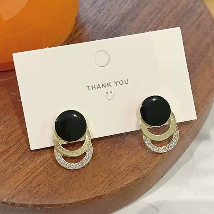 Boucles d'oreilles rondes émaillées noires pour femmes, clous d'oreilles géométriques creux en cristal, bijoux élégants pour mariage et fête
