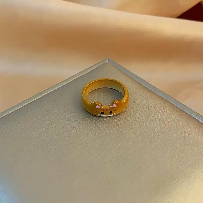 Nouvelle bague en céramique motif chat de dessin animé, style unique et créatif, cœur féminin minimaliste, pour femme, bijoux tendance, nouveauté