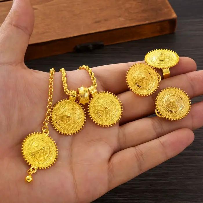 Parures de bijoux éthiopiens : pendentif rond, boucles d'oreilles, bague, chaîne de tête – Ensembles 4 pièces pour mariages africains et érythréens, fiançailles, cadeaux ethniques