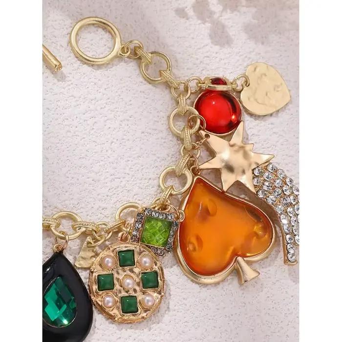 Bracelet à breloque cœur doré exagéré, orné de fleurs et de strass pour des bijoux de soirée élégants