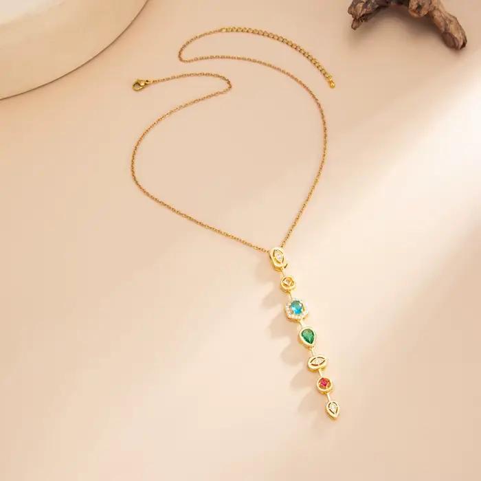 Parure de bijoux de luxe pour femme : Collier et bracelet en acier inoxydable avec pendentif géométrique doré incrusté de pierres précieuses colorées