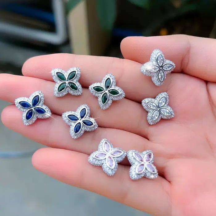 Pera – boucles d'oreilles blanches simples en forme de fleur à quatre feuilles, cadeau de fête de fiançailles, accessoire à la mode pour femmes, SE004