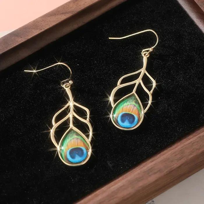 Boucles d'oreilles en plumes de paon, bijoux d'amoureux des animaux