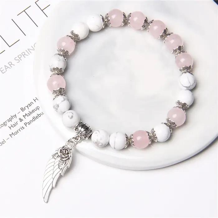 Bracelet pendentif aile d'ange Rose couleur argent fait à la main