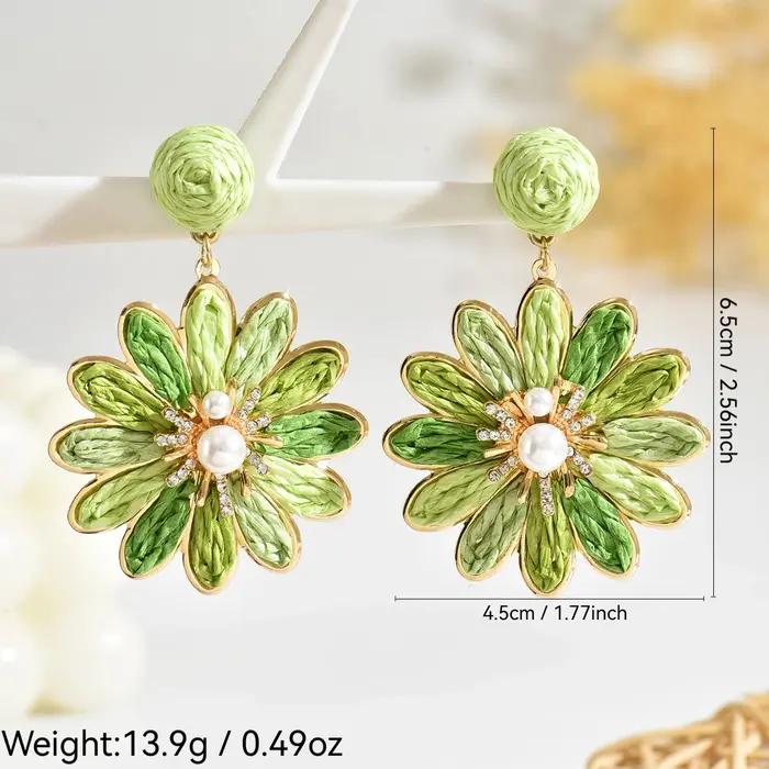 Boucles d'oreilles bohémiennes élégantes et colorées en forme de fleur de raphia pour femmes et filles
