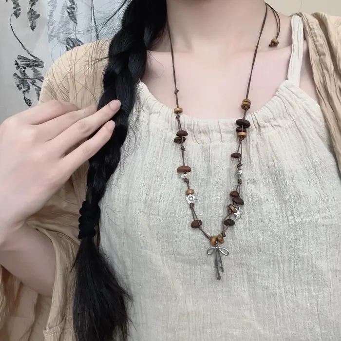 Nouveau collier en perles de café de style chinois pour femmes avec chaîne de pull ajustable et accessoires