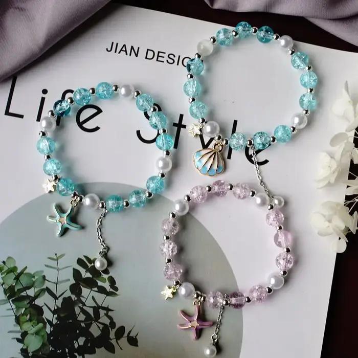 Bracelet pop-corn étoile de mer avec perle de cristal