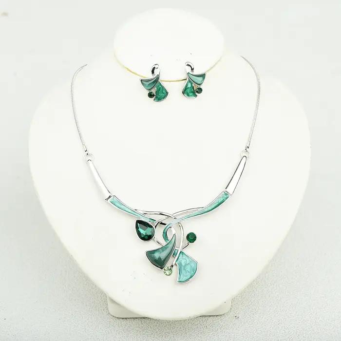 Ensemble de bijoux ICEYY en résine plaquée or pour femmes - Collier et boucles d'oreilles goutte d'eau pour occasions spéciales