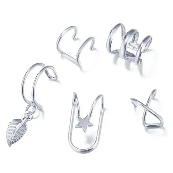 Boucles d'oreilles à clip en forme d'étoile géométrique pour femme en alliage de zinc avec finitions plaqué rhodium or rose et argent pour occasions spéciales