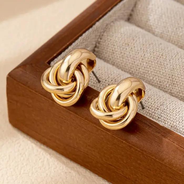 Boucles d'oreilles tendance en acier inoxydable avec nœuds épais pour femmes