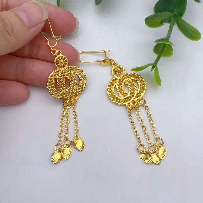 Ensemble de collier et boucles d'oreilles longs et ronds indiens