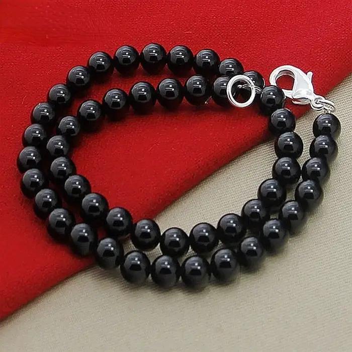 Collier unisexe en perles noires et agate avec fermoir mousqueton