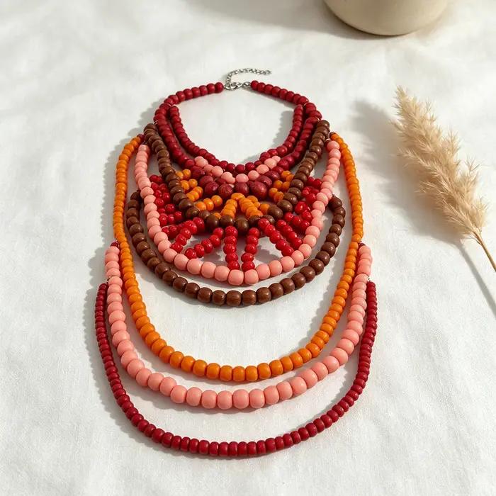 Collier bib bohème multicouche en perles de bois