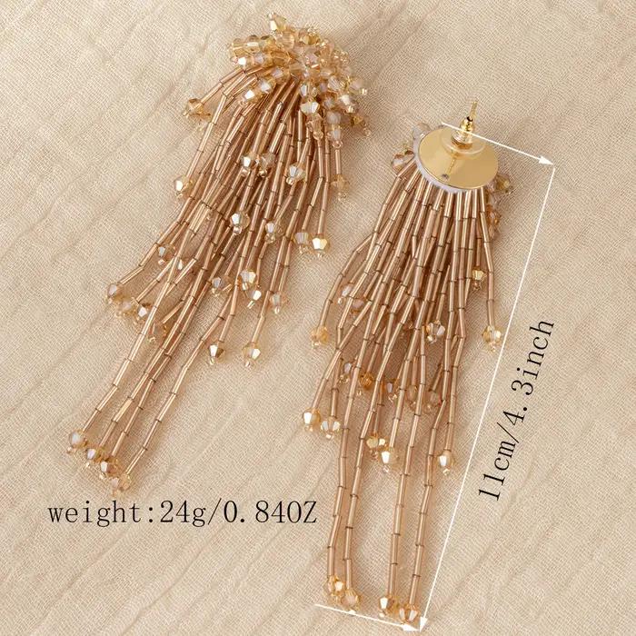 Pendentif pompon très individualiste avec une boucles d'oreilles longues de Style rétro