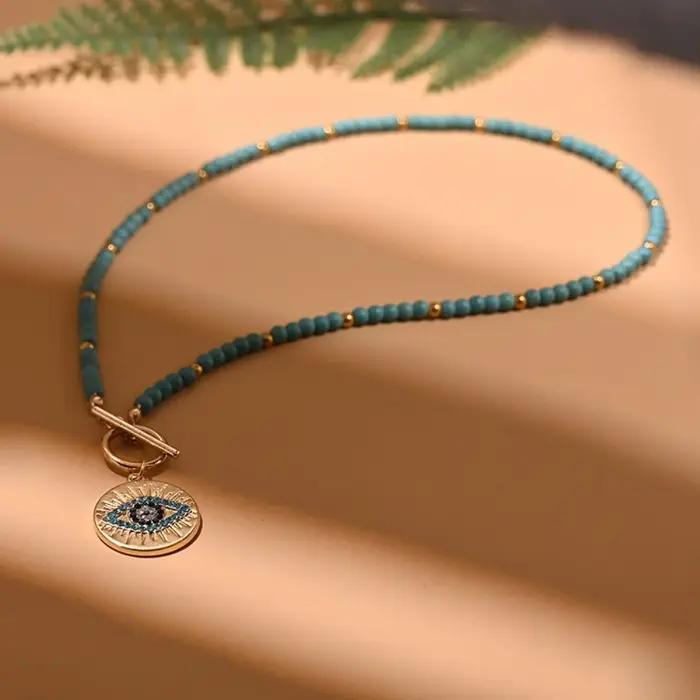 Collier pendentif oeil mignon romantique en alliage de zinc avec chaîne perles pour femmes occasions spéciales tracker d'humeur