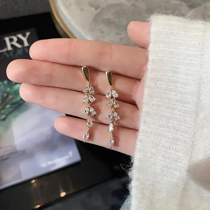 Boucles d'oreilles dorées brillantes en Zircon en forme de feuille pour femmes