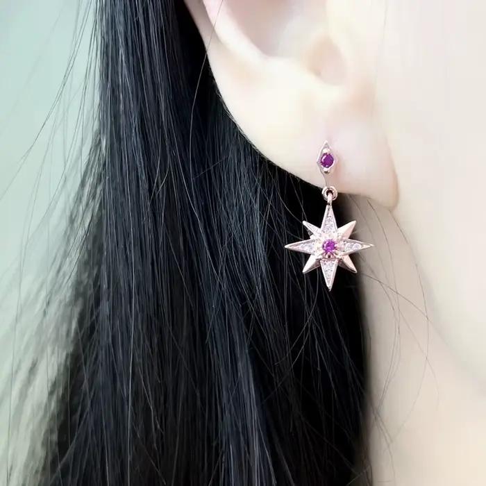 Boucles d'oreilles délicates étoile magique rose