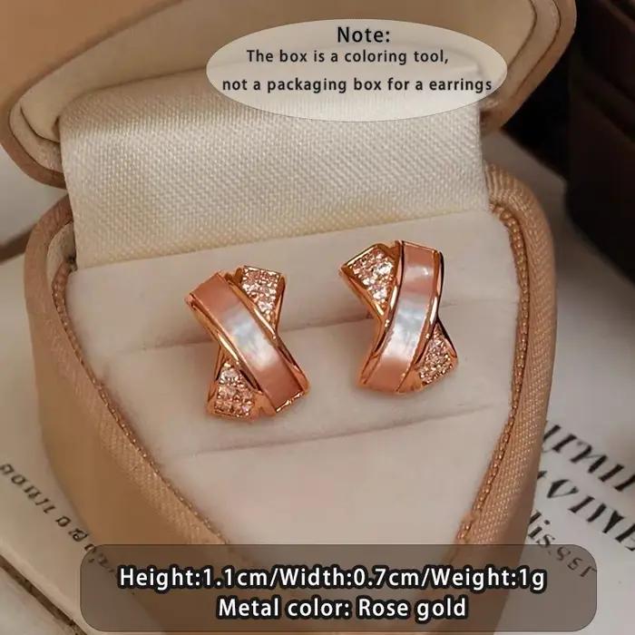 Boucles d'oreilles miniatures en métal couleur or rose avec zircon en forme de coquille entrecroisée pour femme – Bijou