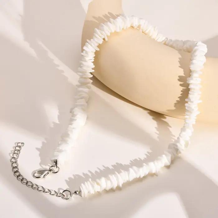 Collier bohème en chaîne de coquillage de Puka