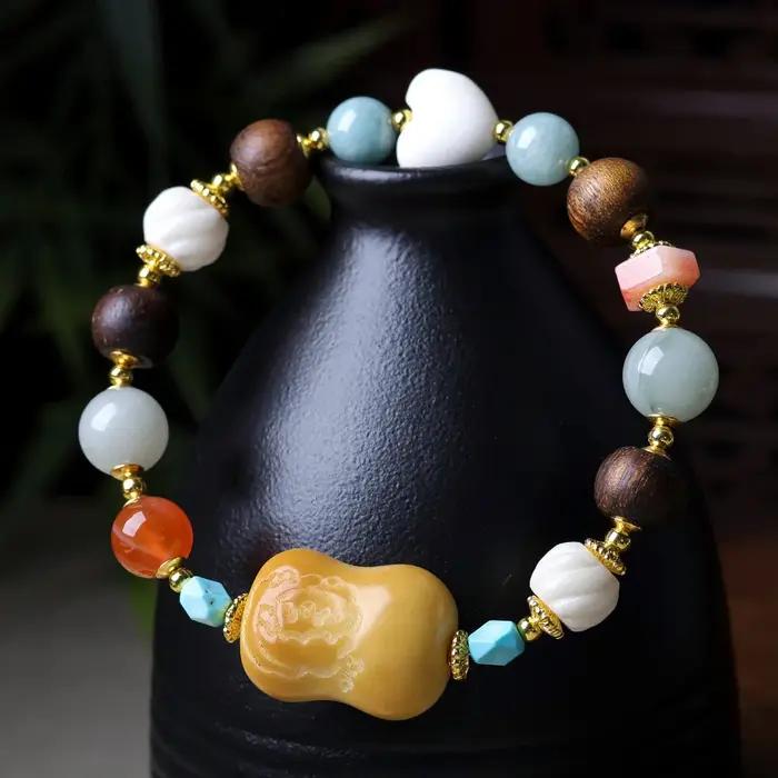 Bracelet en noix de tagua brûlée au charbon avec cœur en corne