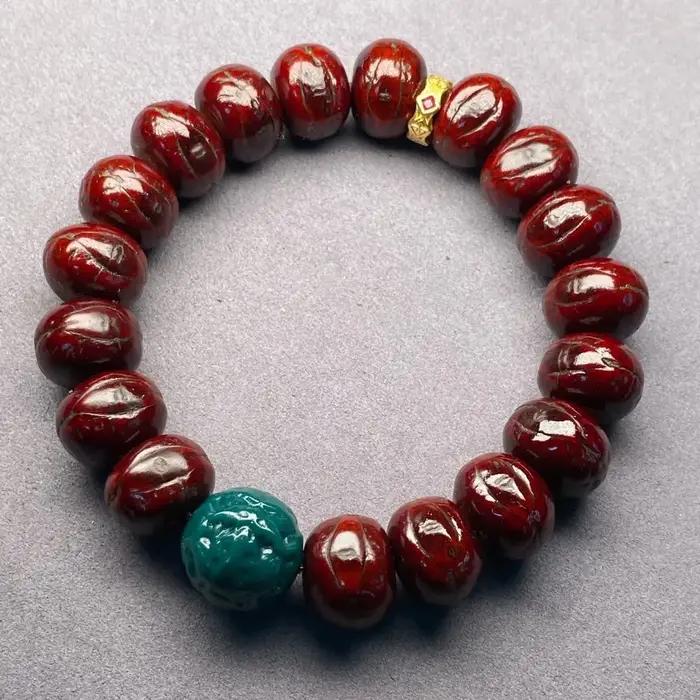 Bracelet tibétain en œil de phénix rouge de 14mm