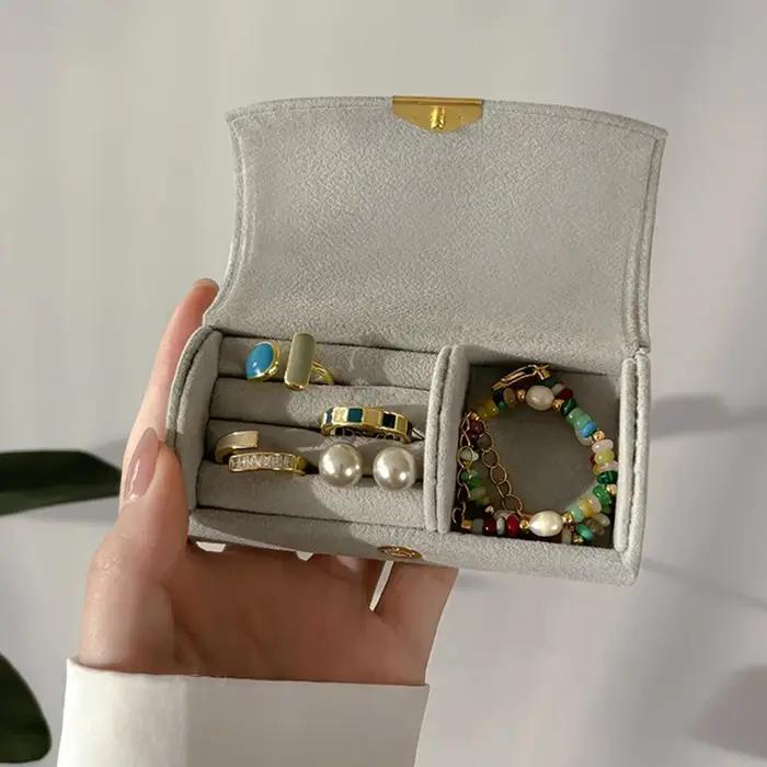 Mini boîte de rangement de bijoux Portable exquise pour les voyages d'affaires des femmes