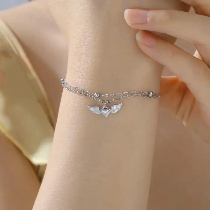 Teamer – Bracelet à breloques en forme d'aile de cœur pour femmes