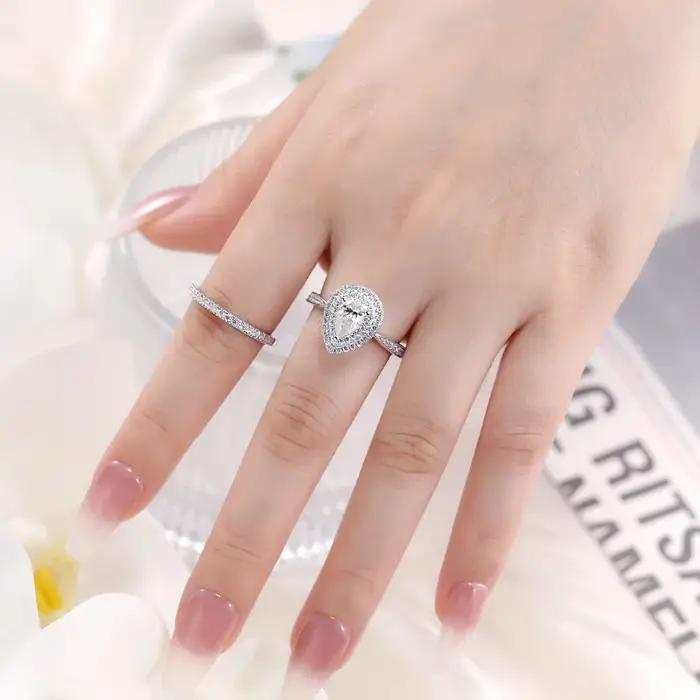 Bague de fiançailles LinkerLove en argent S925 avec moissanite taille poire 1 carat et double halo d'accentuations en