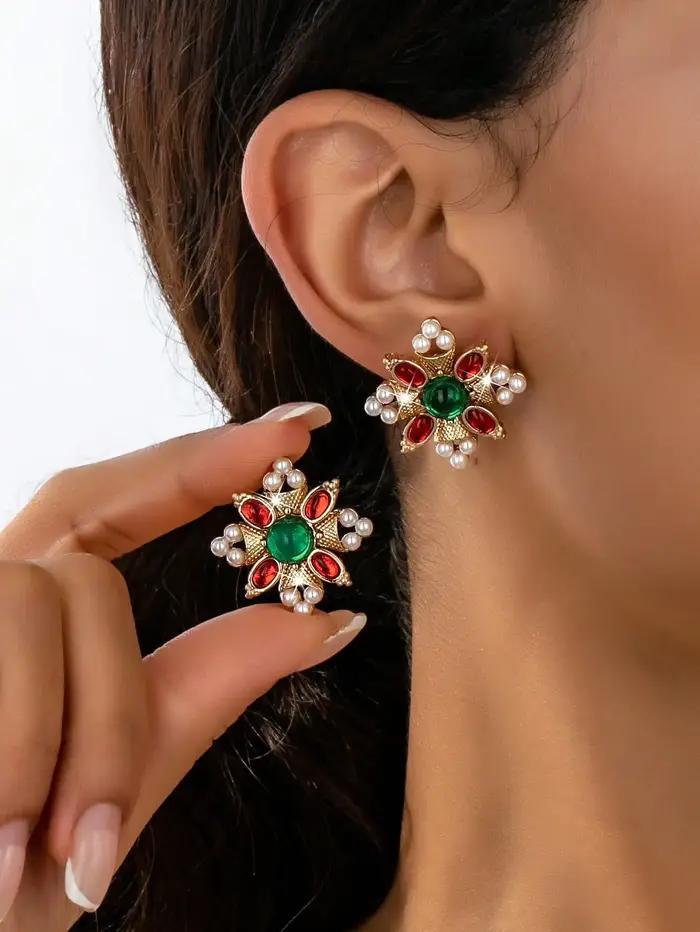 Une paire de boucles d'oreilles pour femmes tendance