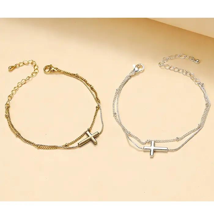 Bracelet croix délicat plaqué or 14 carats pour femme