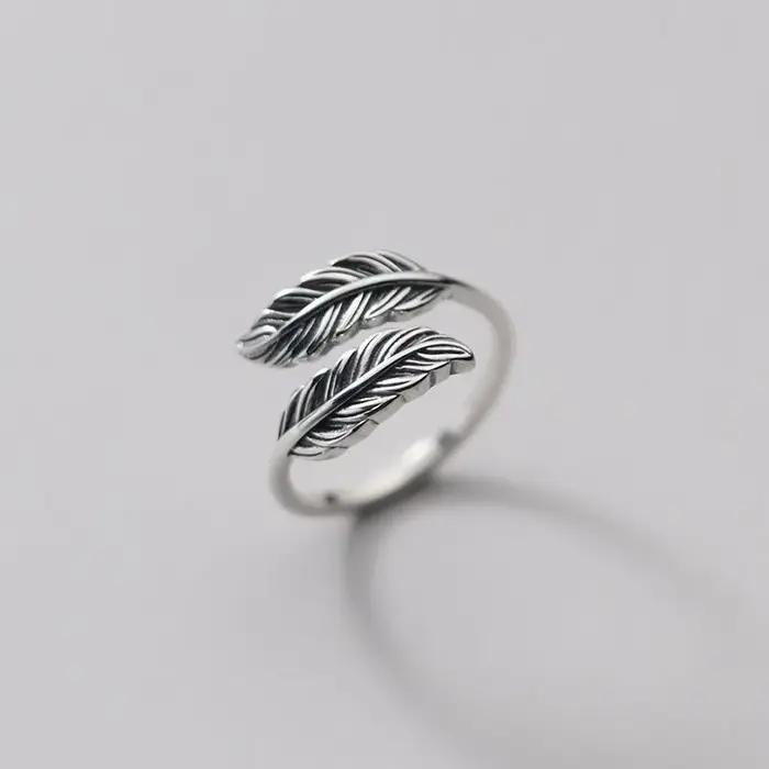 Bague en argent sterling 925 motif plume élégante pour femmes occasions spéciales engagement anniversaire mariage cadeau chic