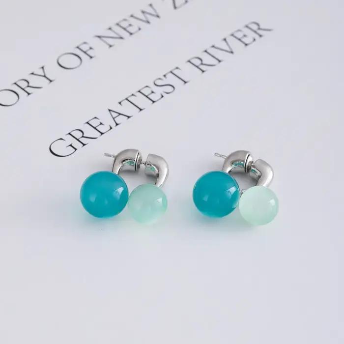 Boucles d'oreilles élégantes d'été