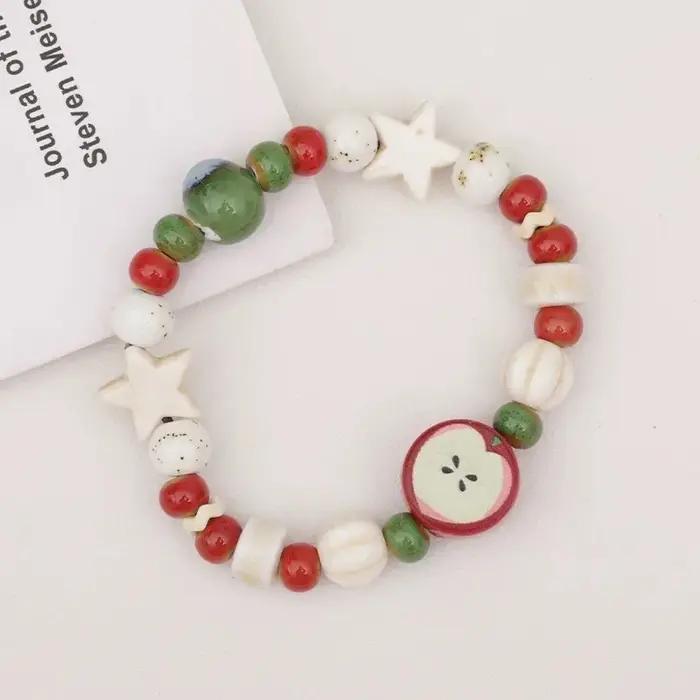 Bracelet en céramique de perles d'os de fruits multicolores fait à la main pour femmes, extensible, bijoux ethniques Boho pour occasions spéciales