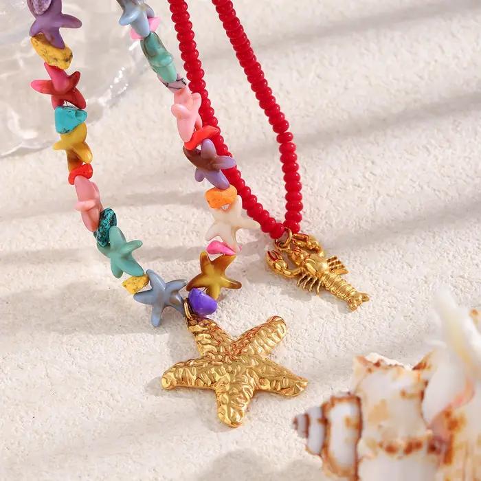 Colliers pendentifs E.B.belle en forme d'écrevisse et d'étoile de mer