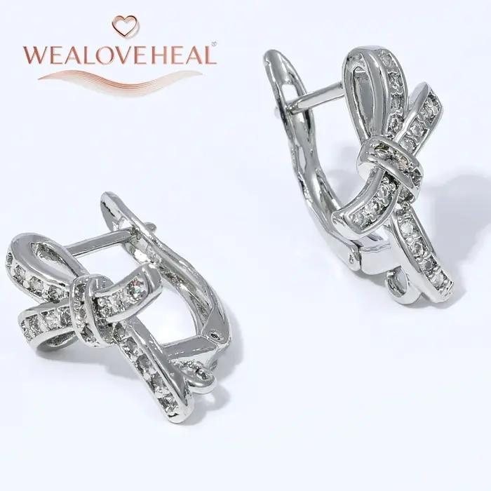 Crochets d'oreilles de luxe en laiton plaqué or 18 carats avec nœud papillon