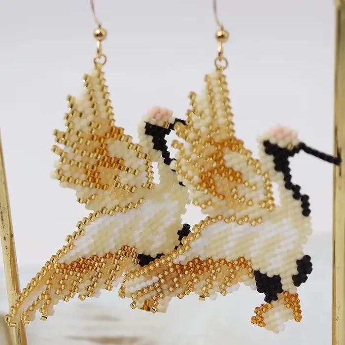 Boucles d'oreilles perlées pour oiseaux de perroquet, boucles d'oreilles en perles de riz, alliage simple, conception originale de Bohême, tricot à la main, marée