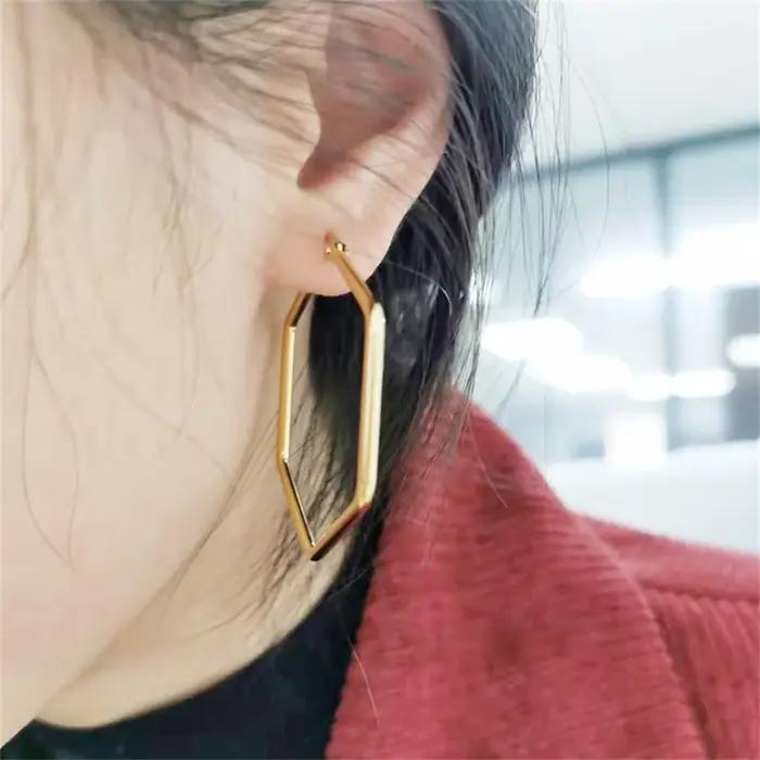 Boucles d'oreilles créoles en forme d'hexagone pour femmes